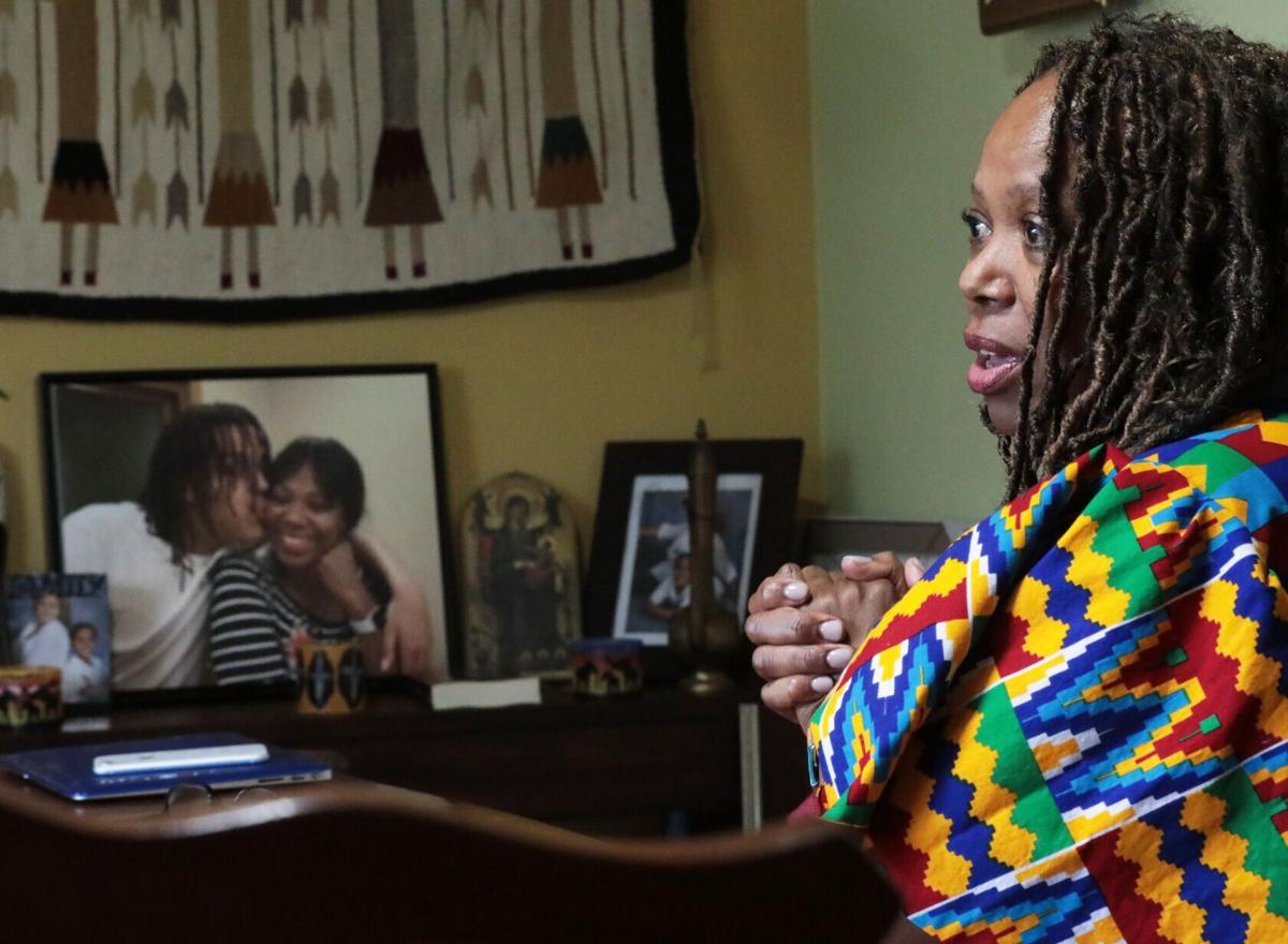 Margaret with framed photos