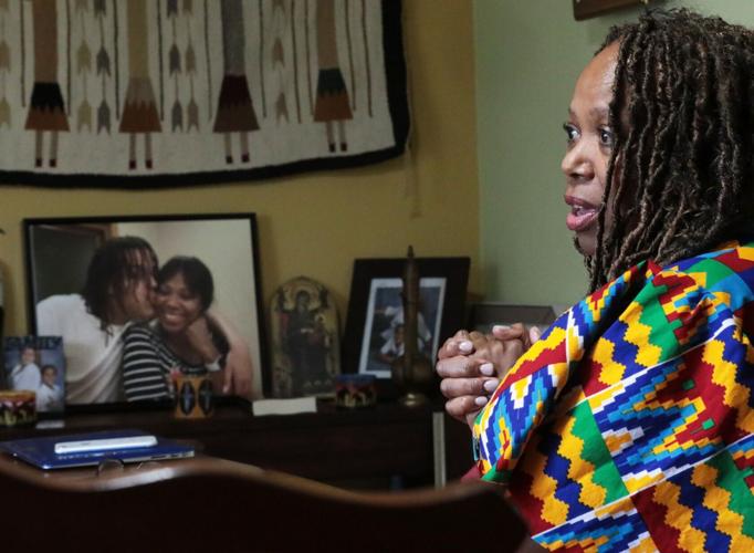 Margaret with framed photos