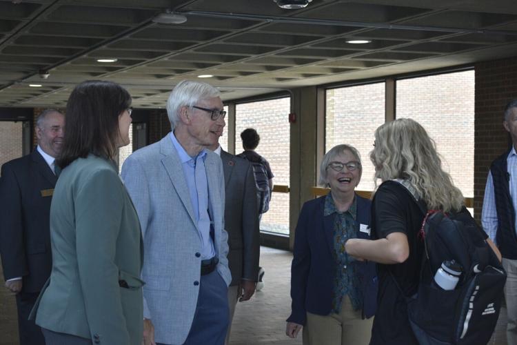 Gov. Tony Evers speaks with UW-Parkside student