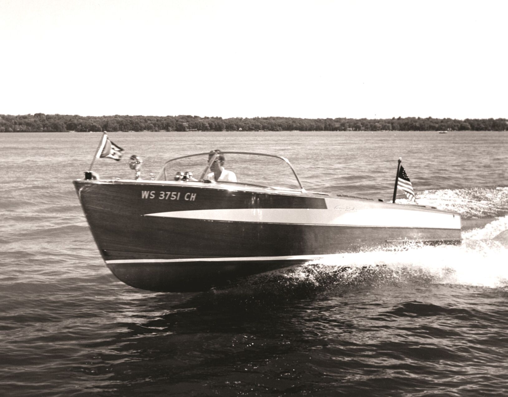 Bill Gage, Sr. drives a Gage-Hacker boat