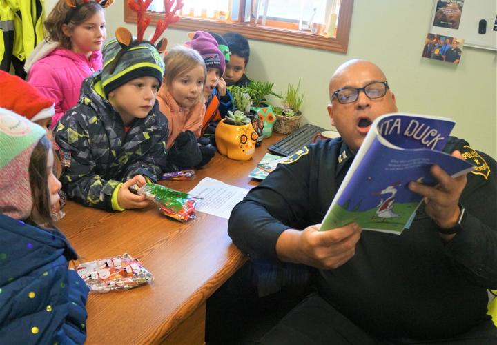 Holiday story time with Capt. Joaquin Alonzo at the Walworth Police Department