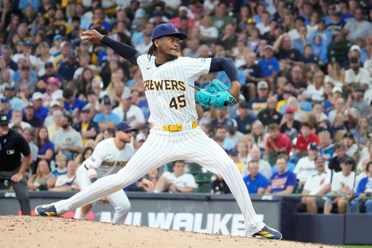Aug 9, 2026; Milwaukee, Wisconsin, USA; Milwaukee Brewers relief pitcher Abner Uribe (45) delivers a pitch against the Minnesota Twins in the eighth inning at American Family Field. Mandatory Credit: Michael McLoone-Imagn Images