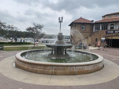 The angel statue that is typically stationed atop the Driehaus Family Fountain has been vandalized once again