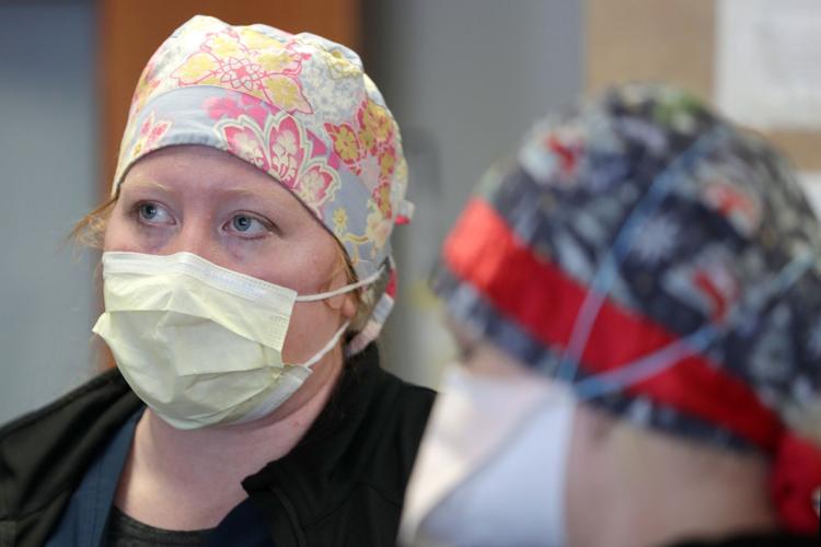 Keeling with hat, mask