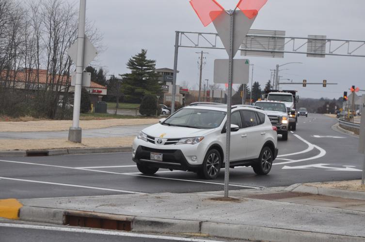 Traffic begins to enter the roundabouts on Highway 120