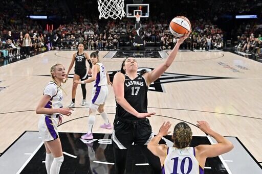 Las Vegas Aces' Megan Gustafson drives