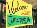 Welcoming sign at Burlington Juneteenth event at Echo Park in Burlington