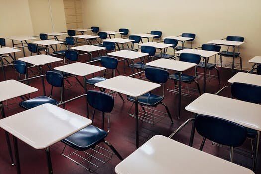Desks in school classroom, generic file photo