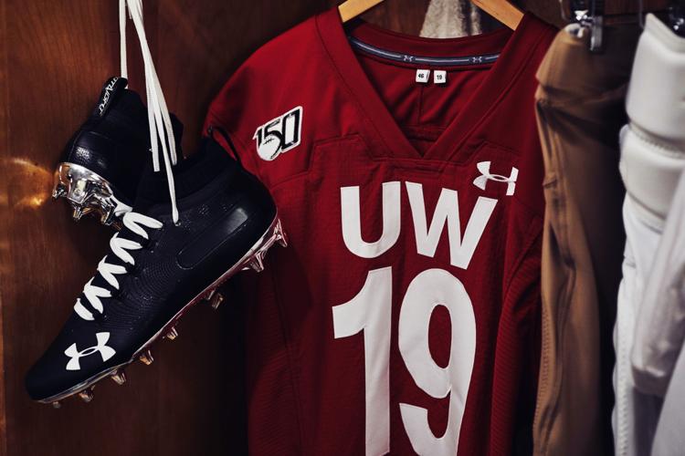 Wisconsin alternate football jersey and cleats