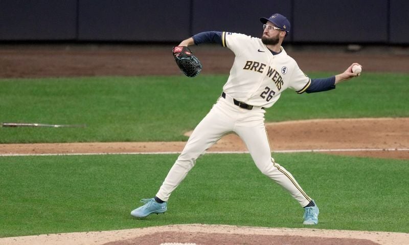 Milwaukee Brewers pitcher Aaron Ashby (26) fields a ground ball hit by San Francisco Giants designated hitter Casey Schmitt during the seventh inning of their game Tuesday, June 2, 2026 at American Family Field in Milwaukee, Wisconsin.