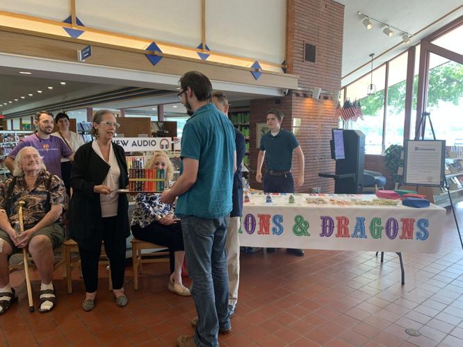 Gail Gygax donates a collection of Gary Gygax's novels to Keith Gerlach