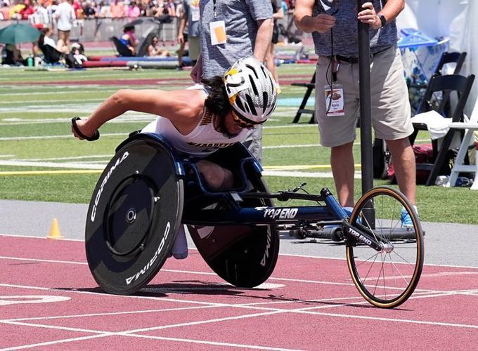 Marquette University High School senior Gianni Quintero sets a meet record in the boys 1600m wheelchair final during the WIAA State Track and Field meet in La Crosse, Wisconsin on Saturday, June 6, 2026.
