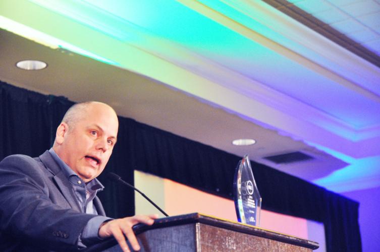 Thomas Walton gives a speech during VISIT Lake Geneva's annual dinner and Impact Awards