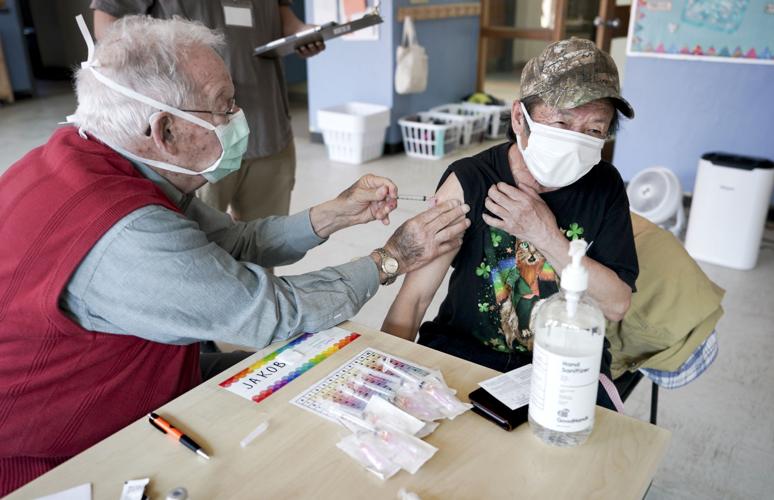 Bernhardt giving shot to Thao