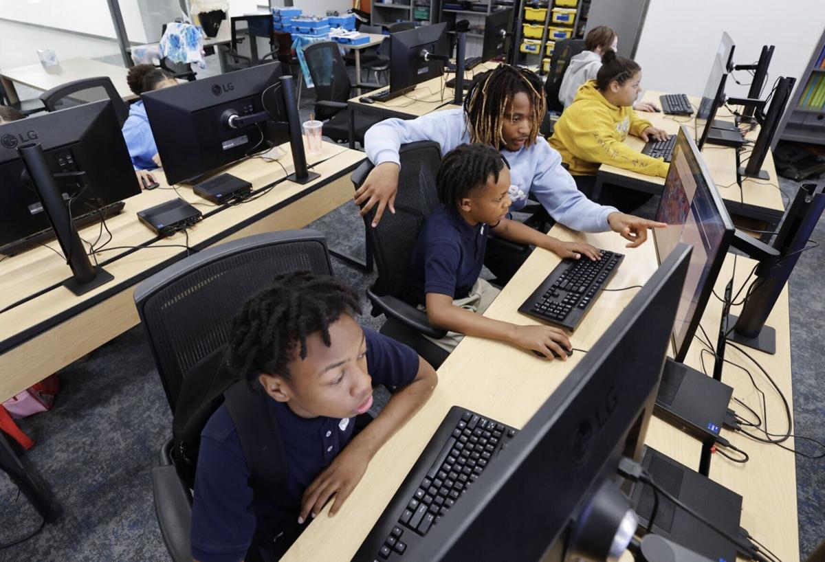One City sixth graders work on coding class