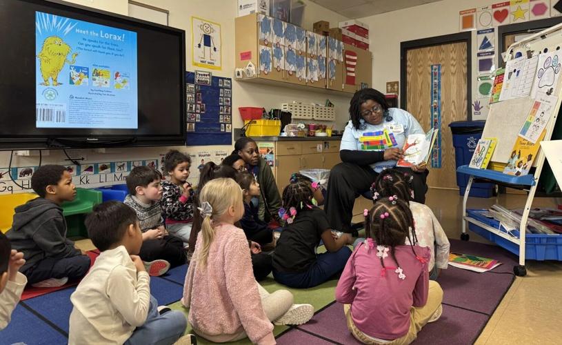 Rasheeda Marks-Walker reads to local children