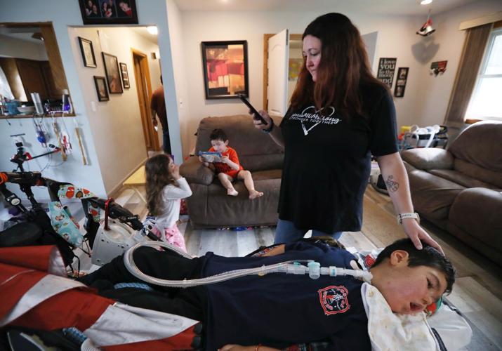 Amy with Mateo, with Amelia and Javier in background