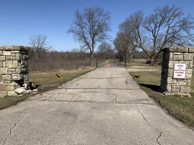 The entrance of the Hillmoor property gives people the option to start  their walk along a paved path or a grassy path