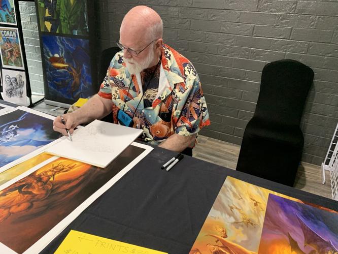 Artist Jeff Easley works on a drawing during EGG Con II