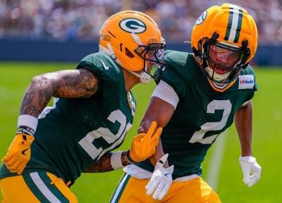 Green Bay Packers cornerbacks Domani Jackson (20) and Brandon Cisse (2) run through a drill during practice on Tuesday, Aug. 4, 2026, at Ray Nitschke Field in Ashwaubenon, Wisconsin. Tork Mason/USA TODAY NETWORK-Wisconsin