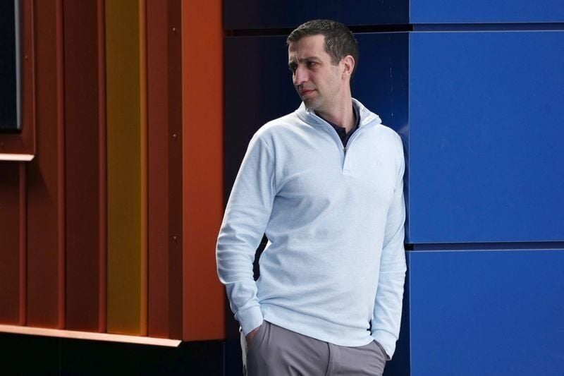 David Stearns, Mets president of baseball operations, watches pitchers warm-up during spring training on Feb. 11, 2026, in Port St. Lucie, Florida.
