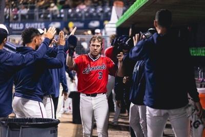 Jacob Hurtubise receives congratulations from the Nashville Sounds dugout during the 2026 season.