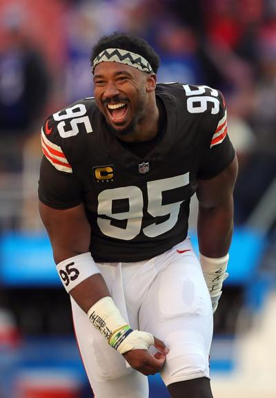 Browns defensive end Myles Garrett is all smiles as he jogs back inside before a game, Dec. 21, 2025, in Cleveland.
