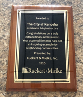 City wins award for infrastructure achievement, donates $1,000 to YMCA program