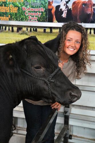 Maggie Dutton of Darien returned from auction with the cross-bred steer