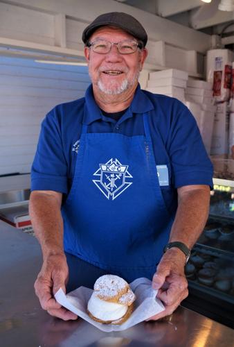 Walworth County Fair: Ron Baughman of the Knights of Columbus serves up a homemade cream puff
