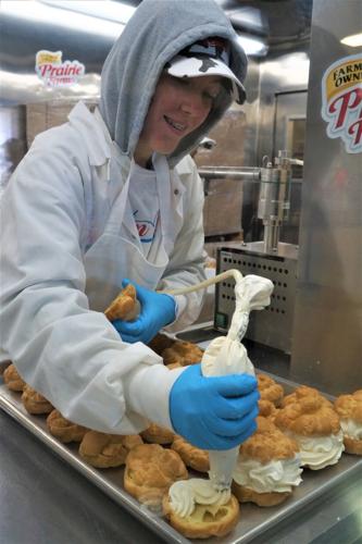 Filling cream puffs at the Wisconsin State Fair