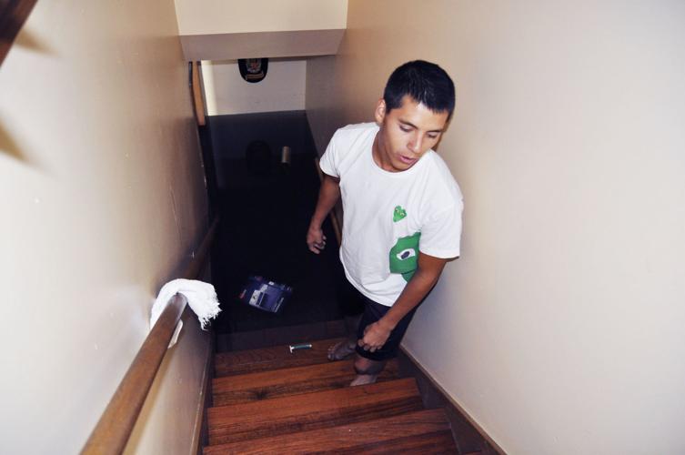 Adrian Hernandez inside flooded house Walworth