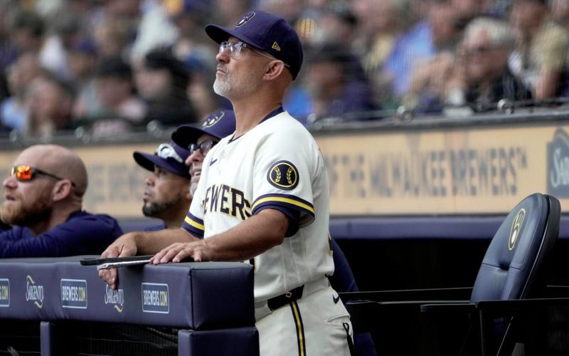Milwaukee Brewers third base coach Matt Erickson (68) is shown during the first inning of their game against the New York Mets