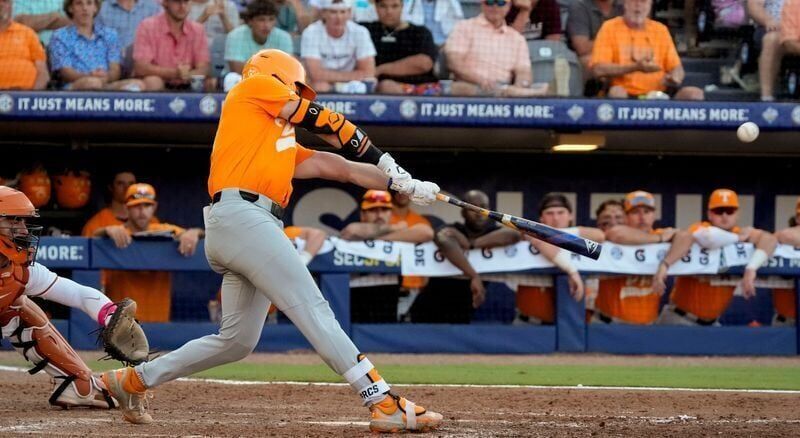 May 22, 2025; Hoover, AL, USA; Tennessee shortstop Gavin Kilen (6) connects for a solo homer to give Tennessee the lead in the 10th inning in the third round of the SEC Baseball Tournament at the Hoover Met. Tennessee eliminated Texas with a 12-inning 7...