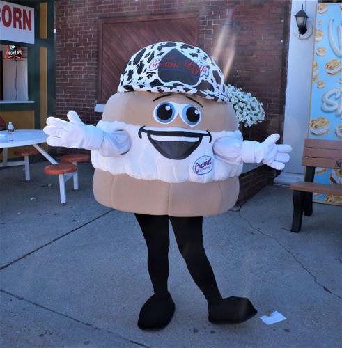 Wisconsin State Fair cream puff mascot Cravin' D. Creampuff