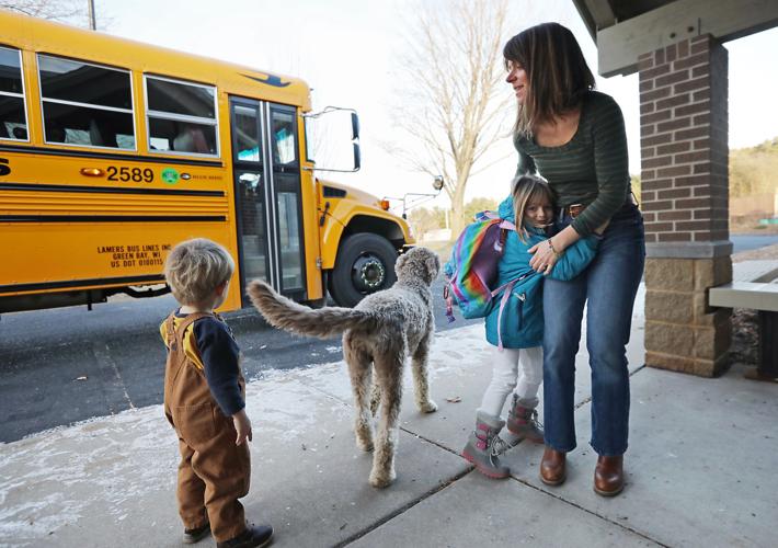 Taryn Seymour with children, dog