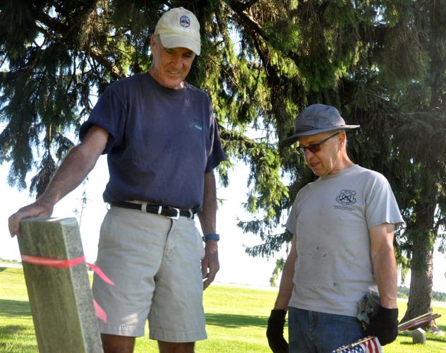 Jerry Hawver, left, and Tim Walters, members of the St. Francis de Sales Cemetery Committee