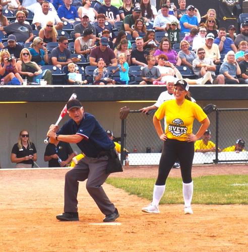 Umpire Daryl Spiegelberg hams it up for the crowd at the July 15 Legends Celebrity Softball Game at Rockford Rivets Stadium