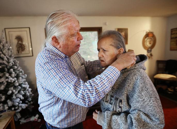 Bill brushing Jacqui's hair