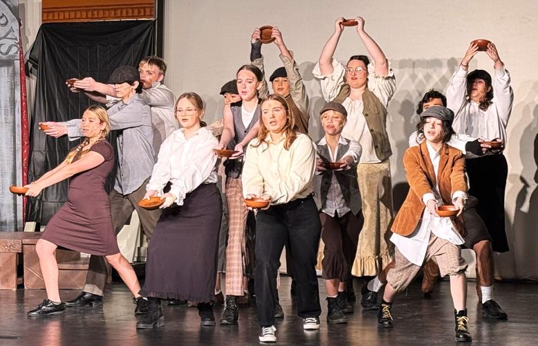 "Food, glorious food! Hot sausage and mustard! While we're in the mood, cold jelly and custard..."