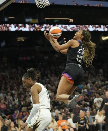 Phoenix Mercury forward Monique Billings (25) lays the ball in against New York Liberty forward Kennedy Burke (2) during the