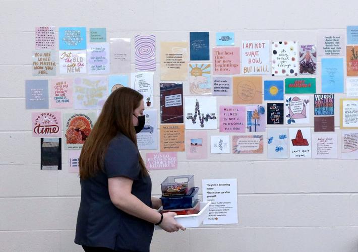 Gym wall with signs