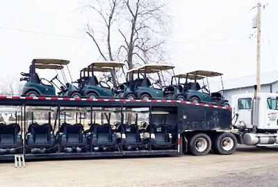 Golf carts on truck at business hit by theft