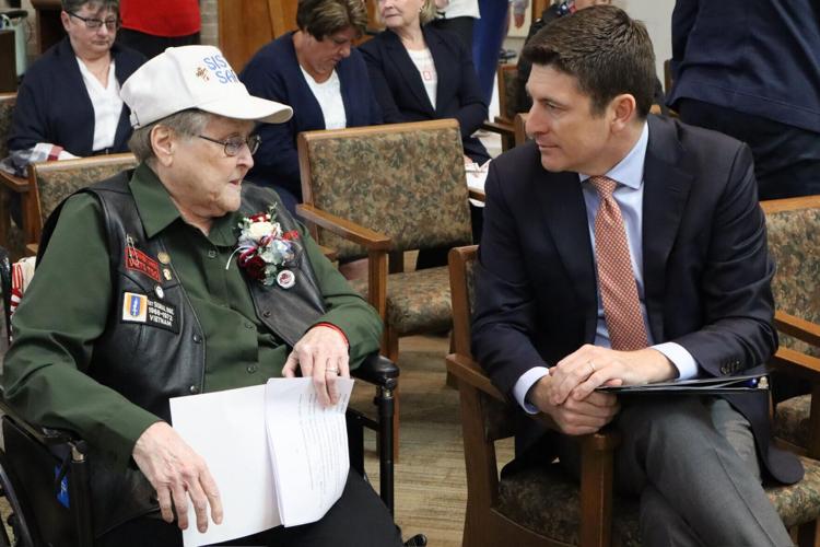 McClenahan speaks with Rep. Steil at award ceremony