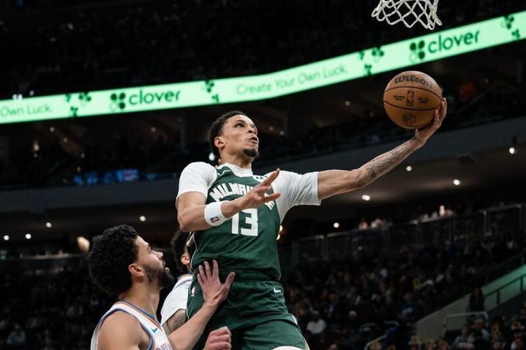 Milwaukee Bucks guard Ryan Rollins (13) scores against the Oklahoma City Thunder in the first half at Fiserv Forum on the evening of Jan. 21, 2026 in Milwaukee, Wisconsin.