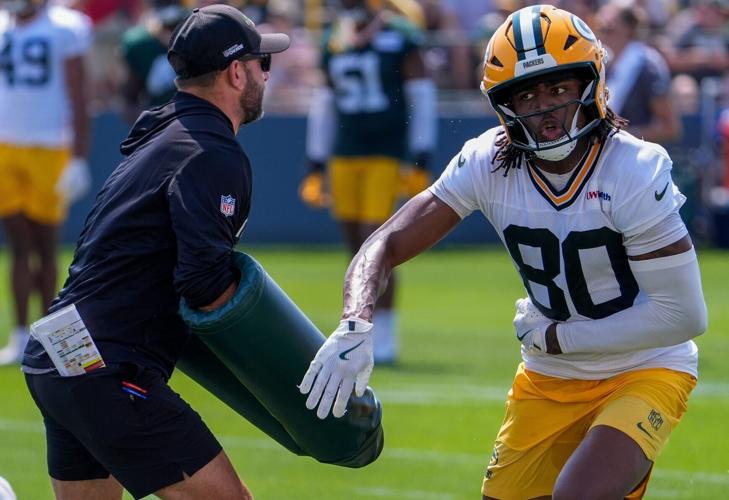 Green Bay Packers wide receiver Isaiah Neyor (80) runs through a drill during the second day of training camp Thursday, July 30,