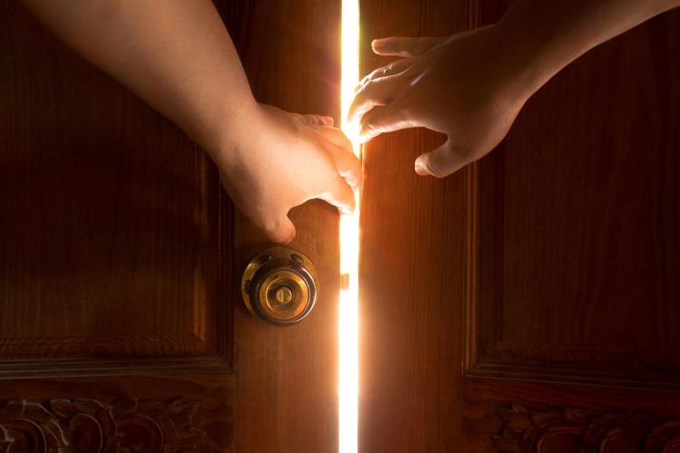 Use your hand to open the door to the light.