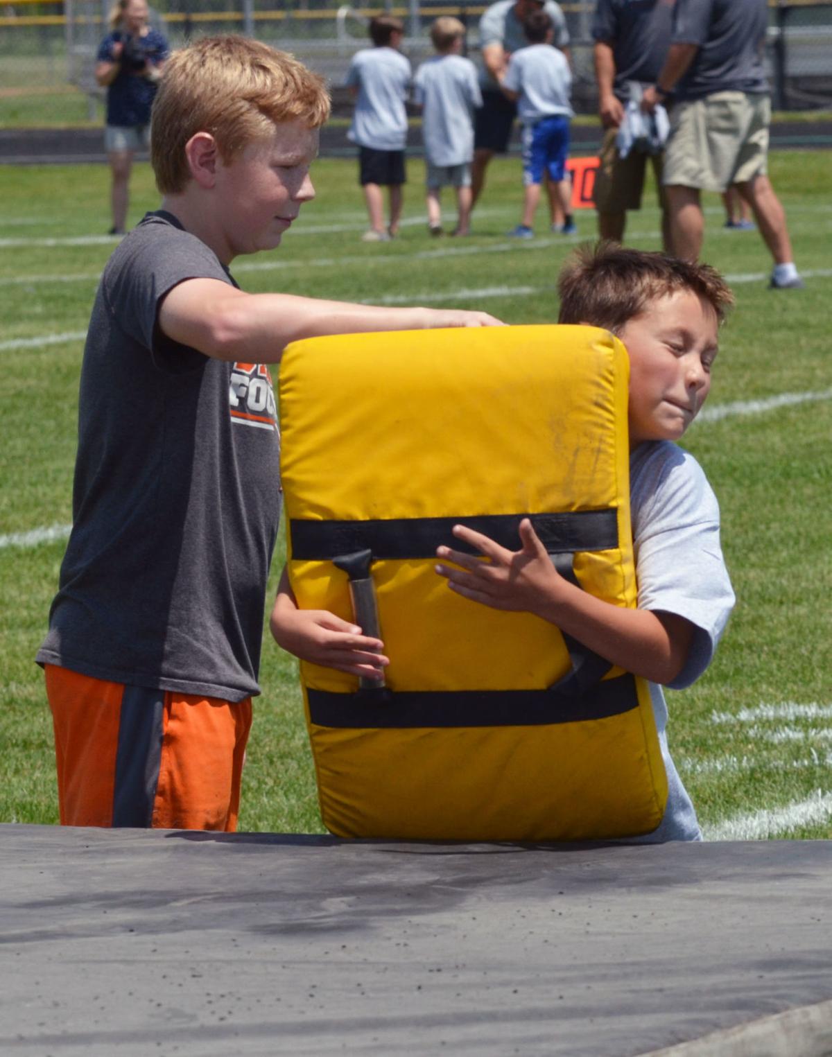 Tony Romo Returns To Burlington For Youth Football Camp Sports