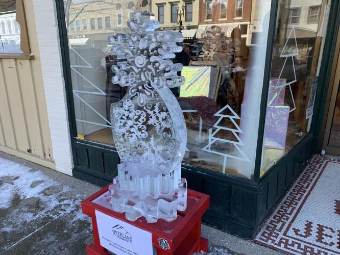Overland clothing store had a wintry-themed ice sculpture featured outside of its business