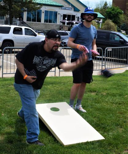 Cornhole bag toss game at Lake Geneva Bacon Fest